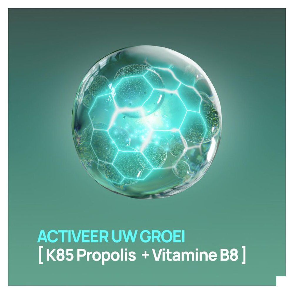 Close-up van een bol met bellen. Tekst: Activeer uw groei. [K85 Propolis + Vitamine B8].