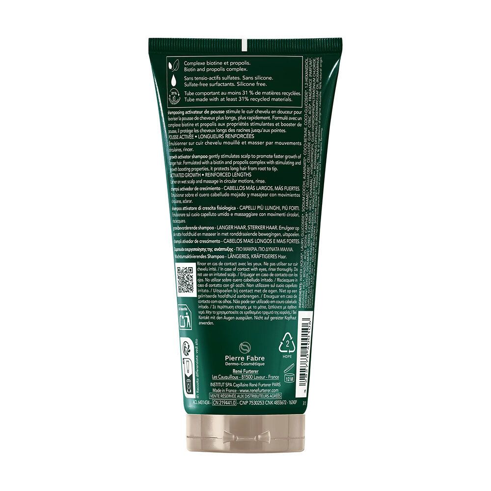 Achterkant van de groene René Furterer Triphasic Active Grow shampoo tube. Tekst en symbolen.