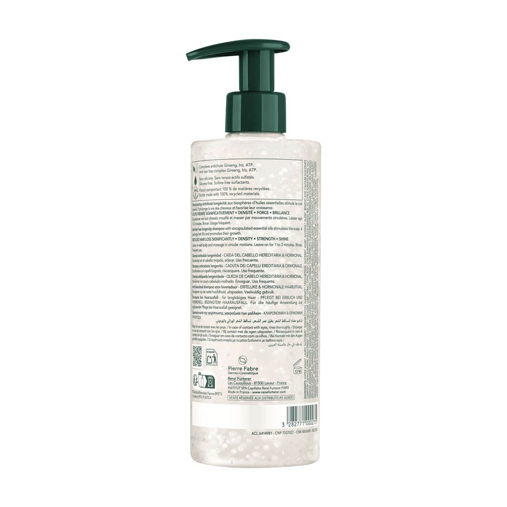 Achterkant van de shampoo fles. Tekst: ingrediënten, fabrikant info, barcode.