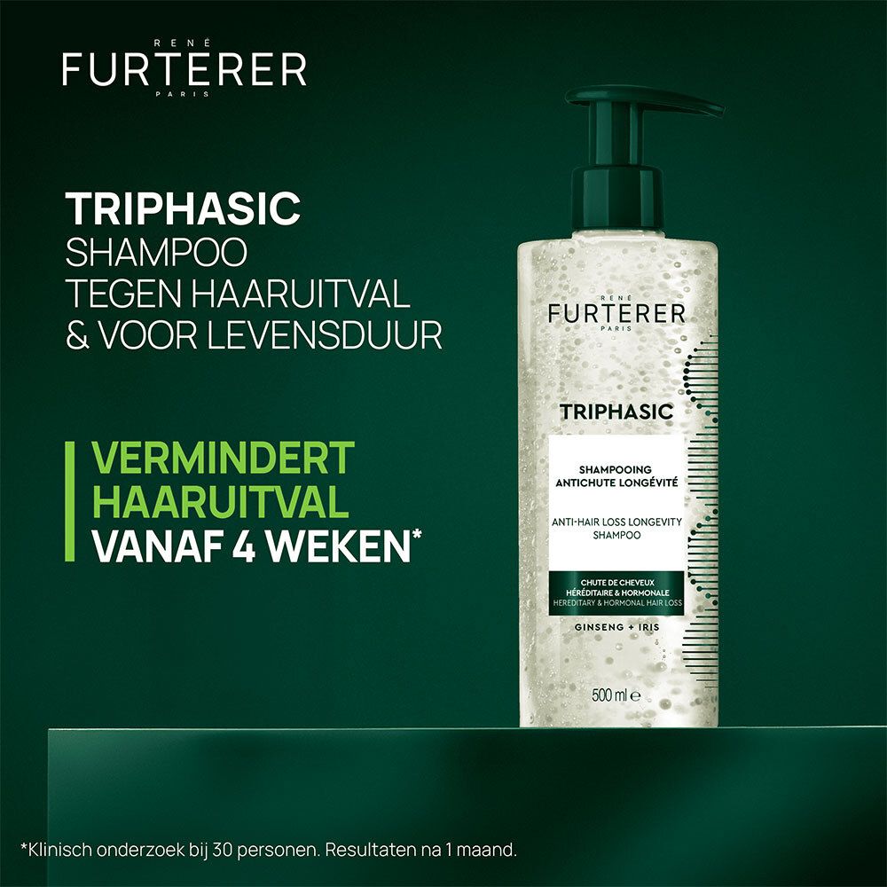 Reclamebeeld. Shampoo fles met tekst: Triphasic Shampoo, tegen haaruitval.