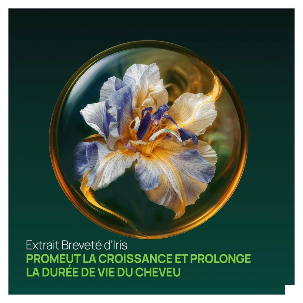 Close-up van een bloem. Tekst: Extrait Breveté d'Iris. Promotes hair growth.
