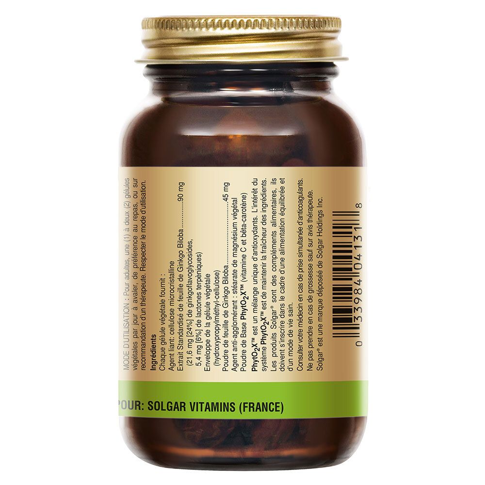 Achterkant van de fles. Label met tekst en ingrediënten. Groene strook onderaan.