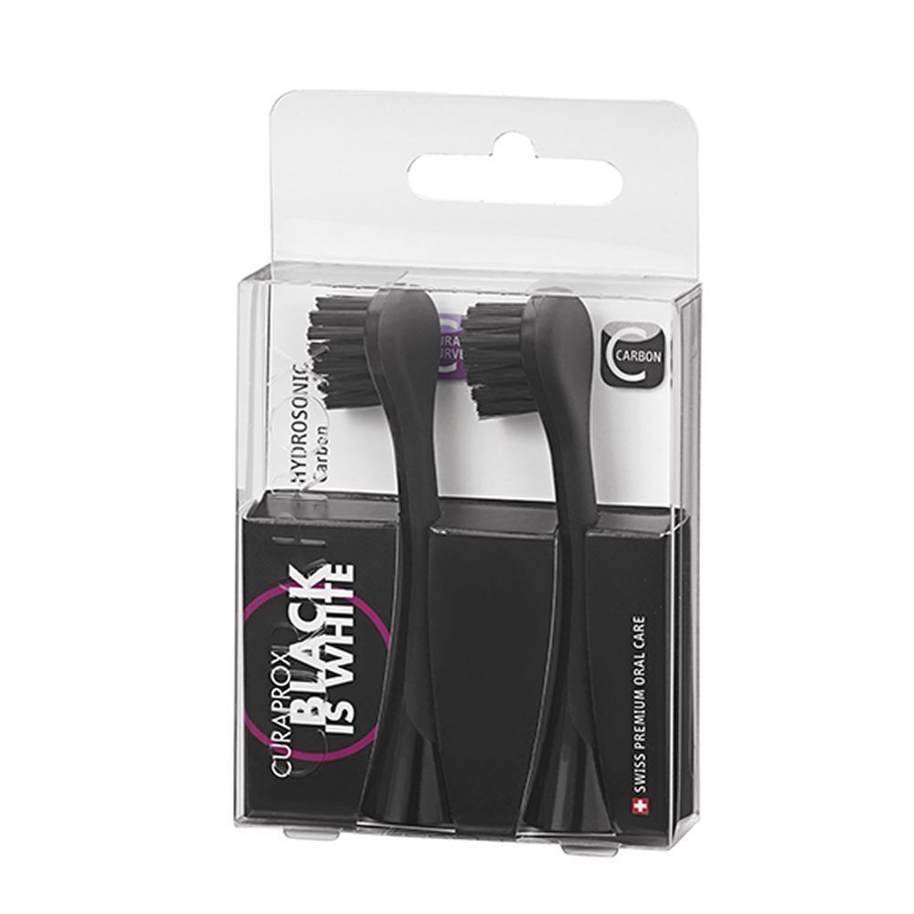 Deux têtes de brosse noires dans un emballage transparent. L'emballage porte les mentions "HYDROSONIC", "carbon" et "BLACK IS WHITE".