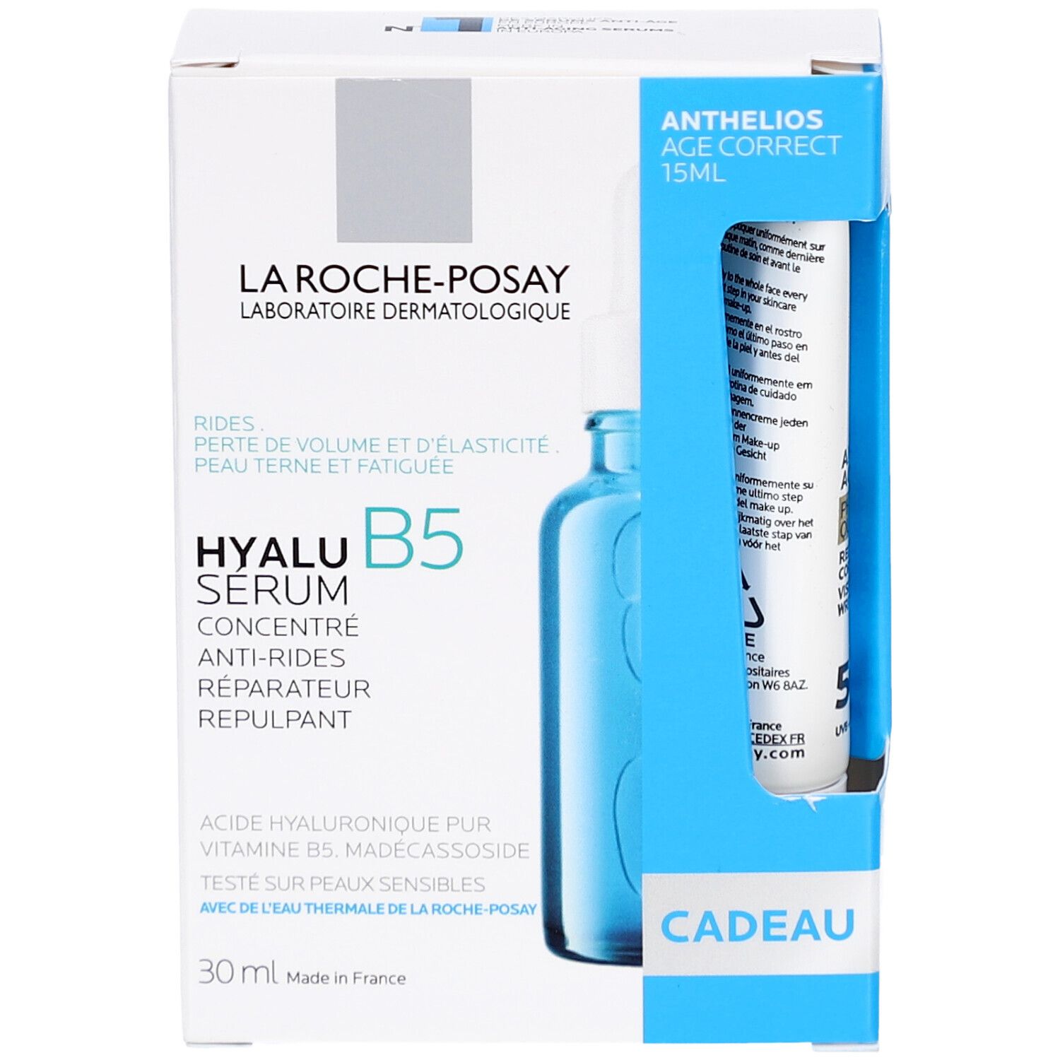 Verpakking met Hyalu B5 Serum en Anthelios Age Correct. Blauw-witte doos met productafbeelding en tekst.