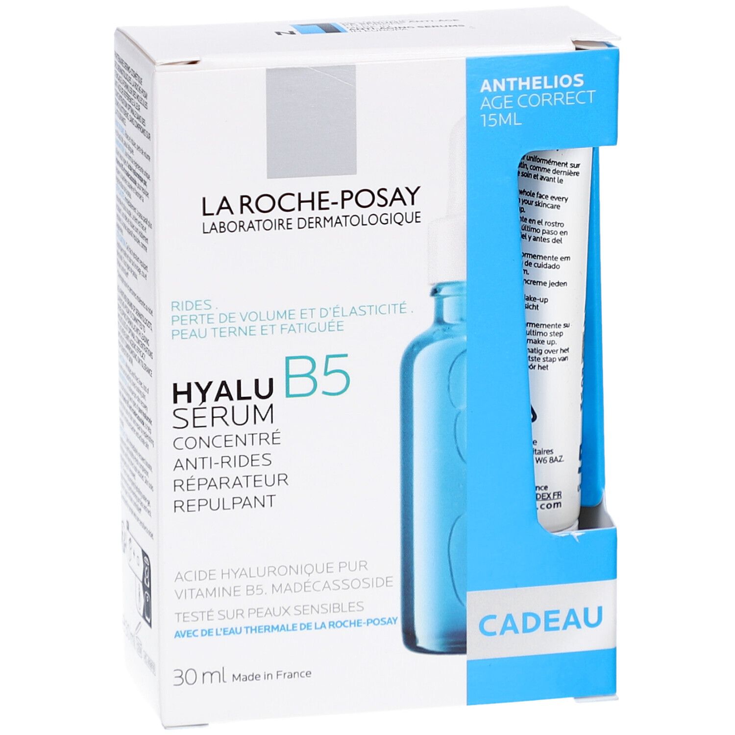 Verpakking met Hyalu B5 Serum en Anthelios Age Correct. Blauw-witte doos met productafbeelding en tekst.