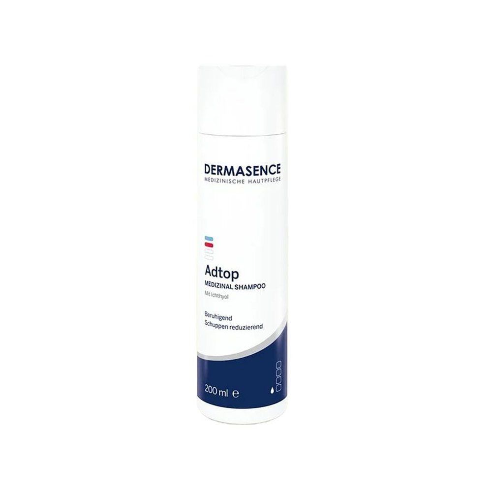 Flacon de shampooing blanc avec texte bleu et rouge. Nom: Dermasence Adtop. Contenance: 200 ml.