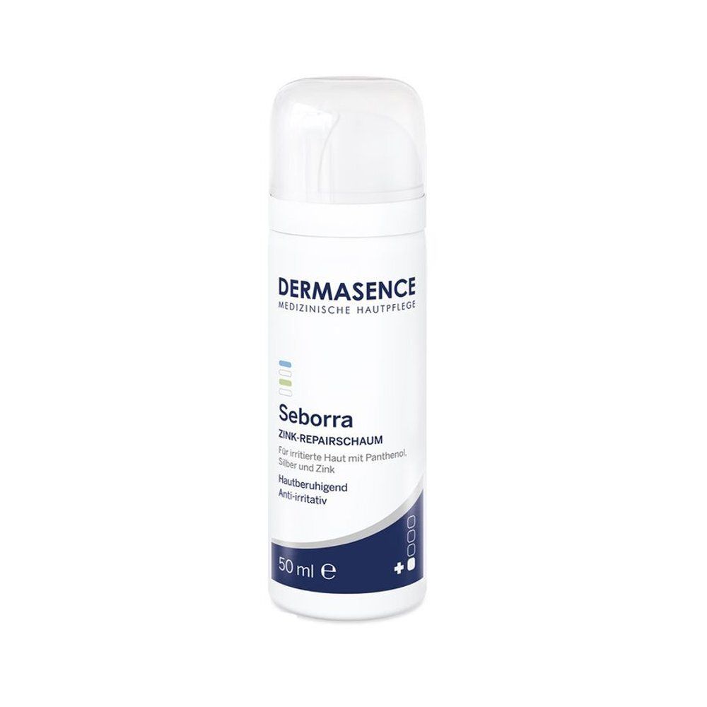 Witte fles met klapdeksel. Opschrift: Dermasence, Seborra Zink-Repairschaum. 50 ml.