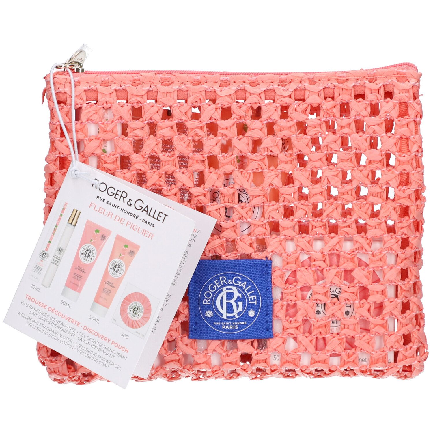 Trousse rose en tissu ajouré avec étiquette. Étiquette avec illustrations de produits et texte Roger & Gallet Fleur de Figuier.