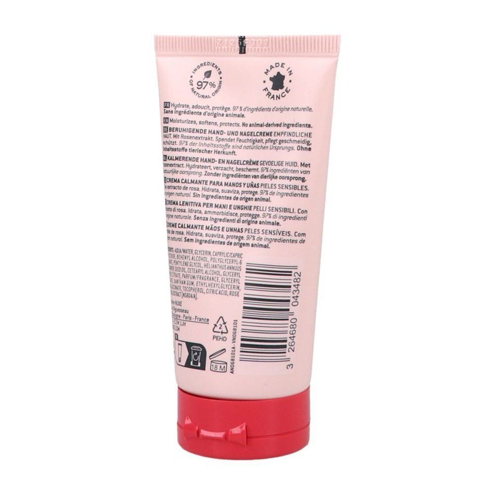 Achterkant van een roze tube hand- en nagelcrème, met productinformatie en barcode.