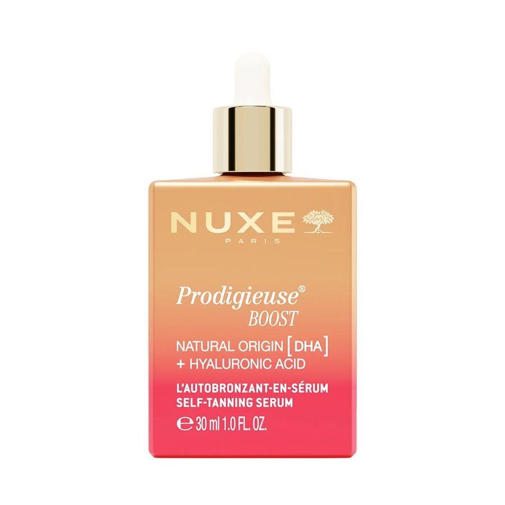 Nuxe Prodigieuse Boost zelfbruinende serum met pipet. Oranje-rode fles, 30ml.