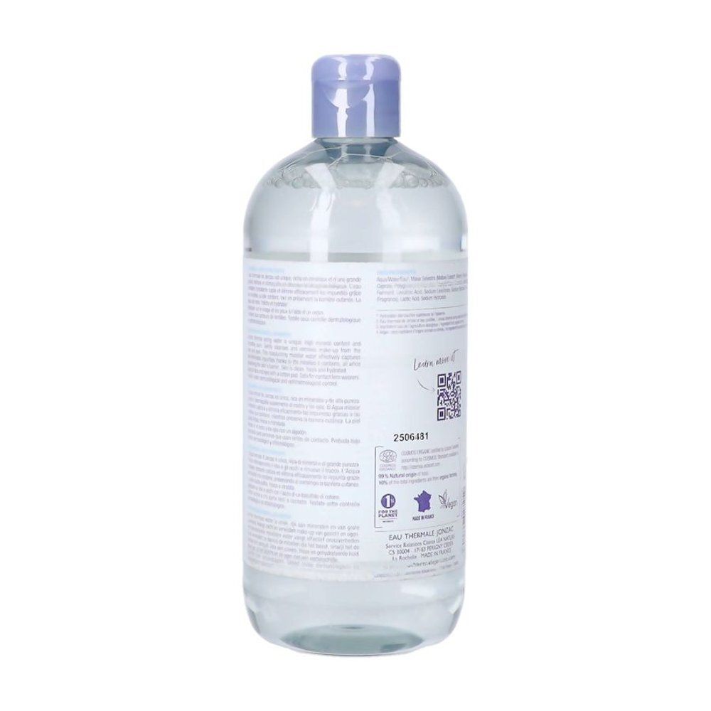 Transparante fles met blauwe dop. Etiket met tekst en QR-code. Franse opschriften.