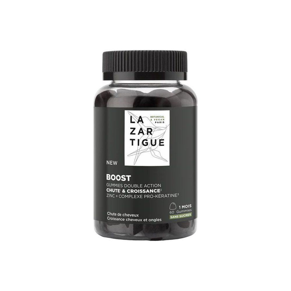 Transparante fles met zwarte dop. Bevat rode gummies. Opschrift: LAZARTIGUE, BOOST, Haaruitval & Groei, Zink + Pro-Keratine.