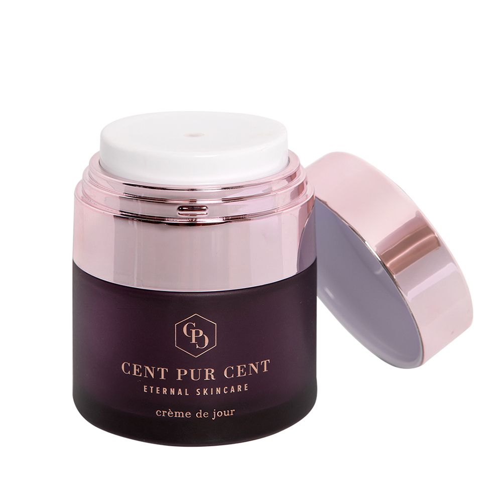 Crèmetiegel met open deksel. Opschrift: CENT PUR CENT, Eternal Skincare, crème de jour.