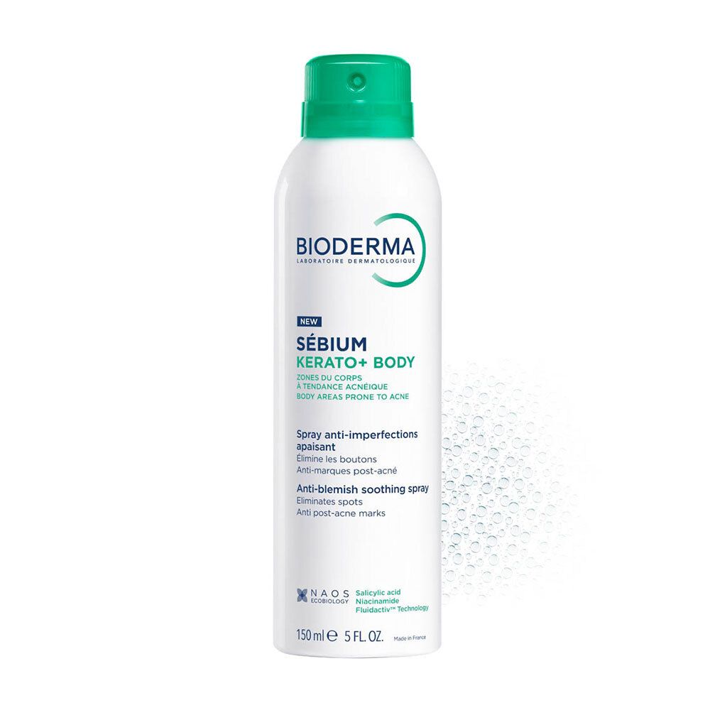 Witte spray met groene dop. Opschrift: Bioderma, Sébium Kerato+ Body. Anti-onzuiverheden, verzachtend.