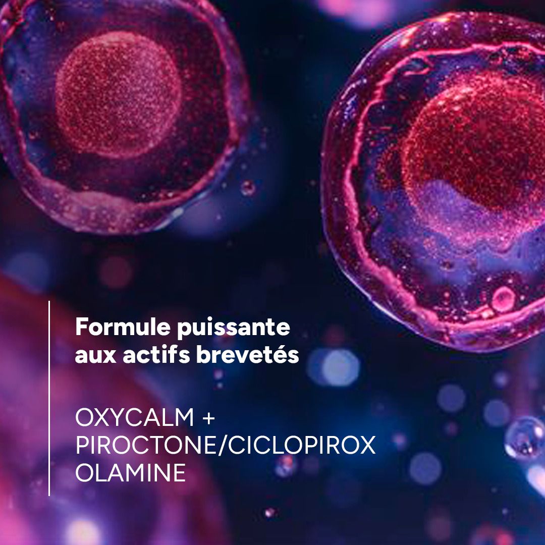 Gros plan sur des cellules. Texte : Formule puissante aux actifs brevetés. OXYCALM + PIROCTONE OLAMINE.