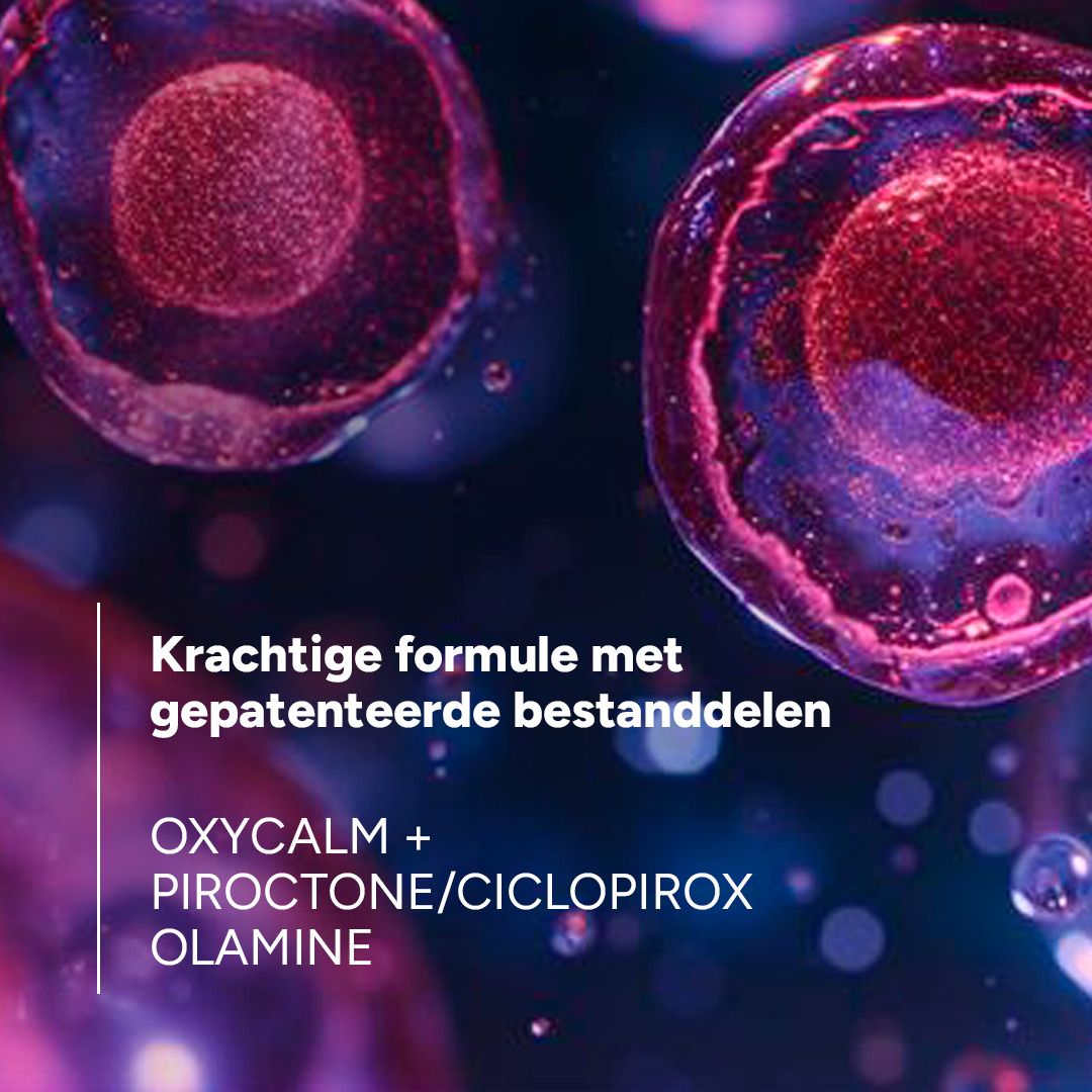Close-up van cellen. Tekst: Krachtige formule met gepatenteerde bestanddelen. OXYCALM + PIROCTONE OLAMINE.