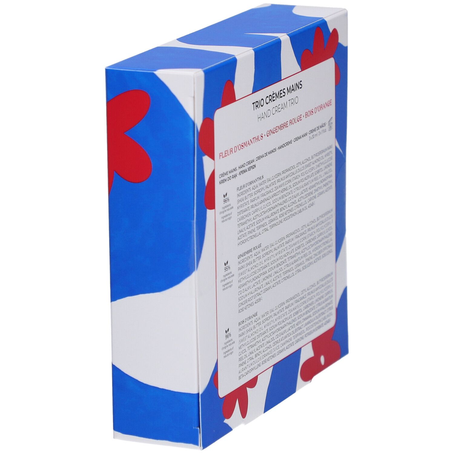 Zijaanzicht van de geschenkverpakking met tekst en ingrediënten. Blauwe doos met bloemenpatroon. Meertalige tekst.