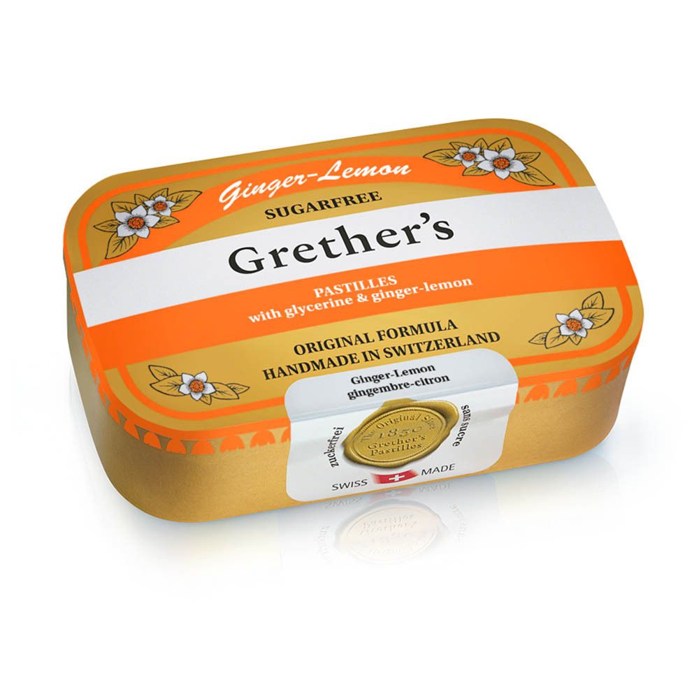 Goudkleurige doos met oranje deksel. Opschrift: Ginger-Lemon, Sugarfree, Grether's Pastilles.