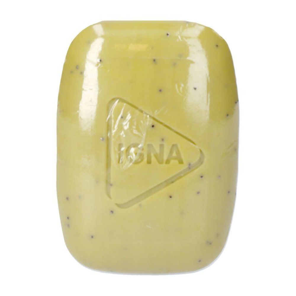 Savon vert clair avec des points noirs. Un logo triangulaire avec l'inscription "IGNA" est imprimé sur la surface.
