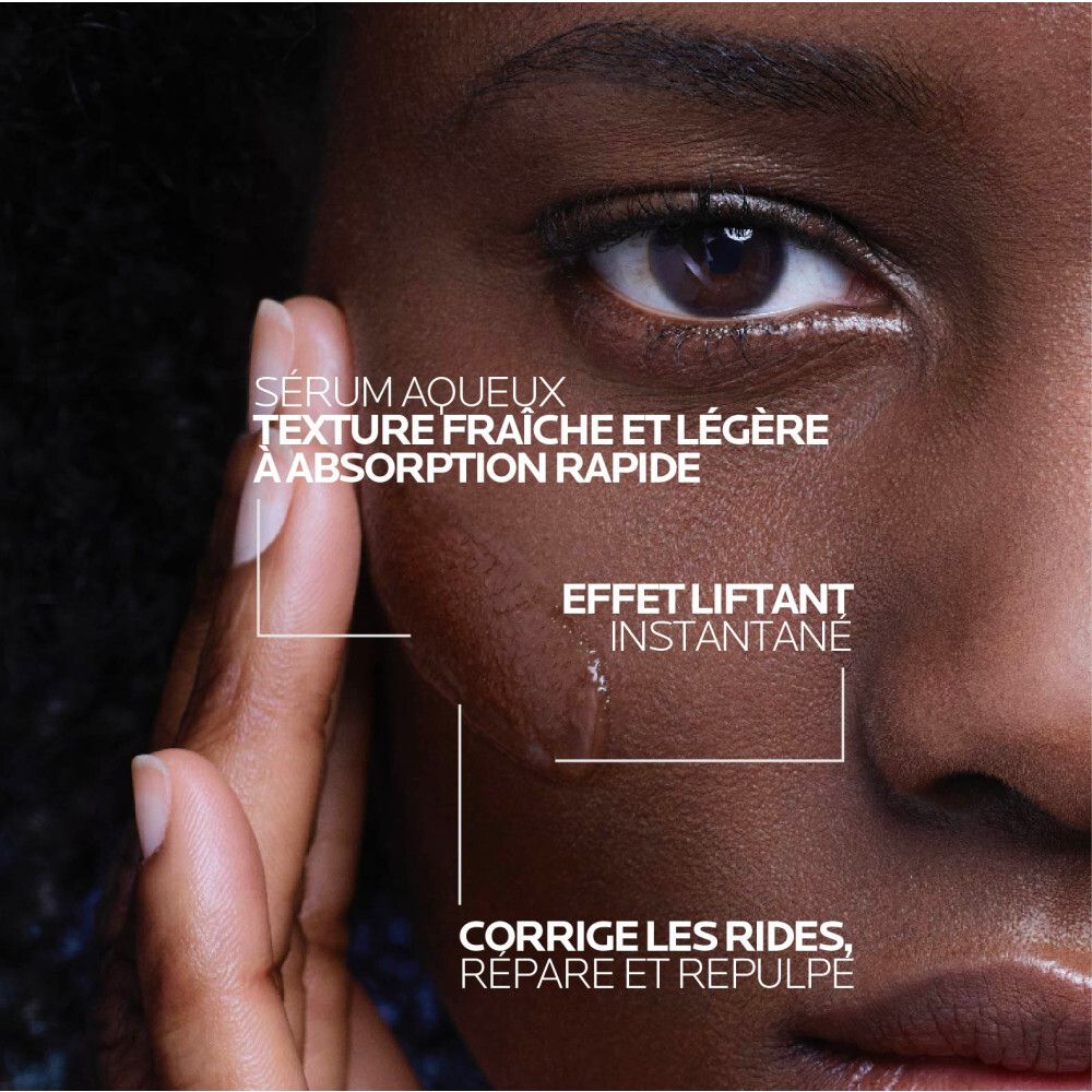 Visage d'une femme. Inscription: Hyalu B5 Sérum Suractivé, répare et repulpe.