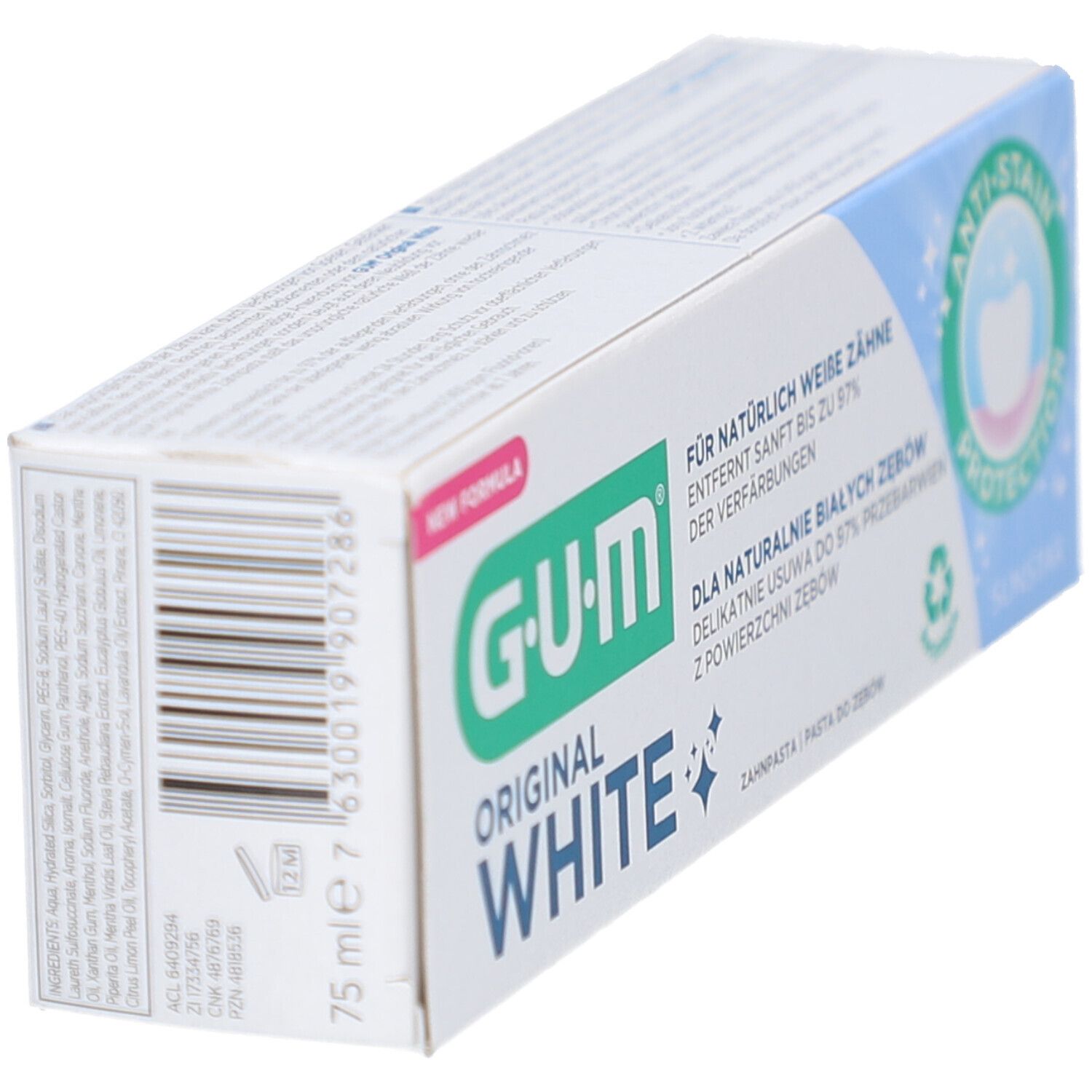 Emballage de dentifrice G-U-M Original White. Éléments bleus et verts. Code-barres et texte sur le côté.