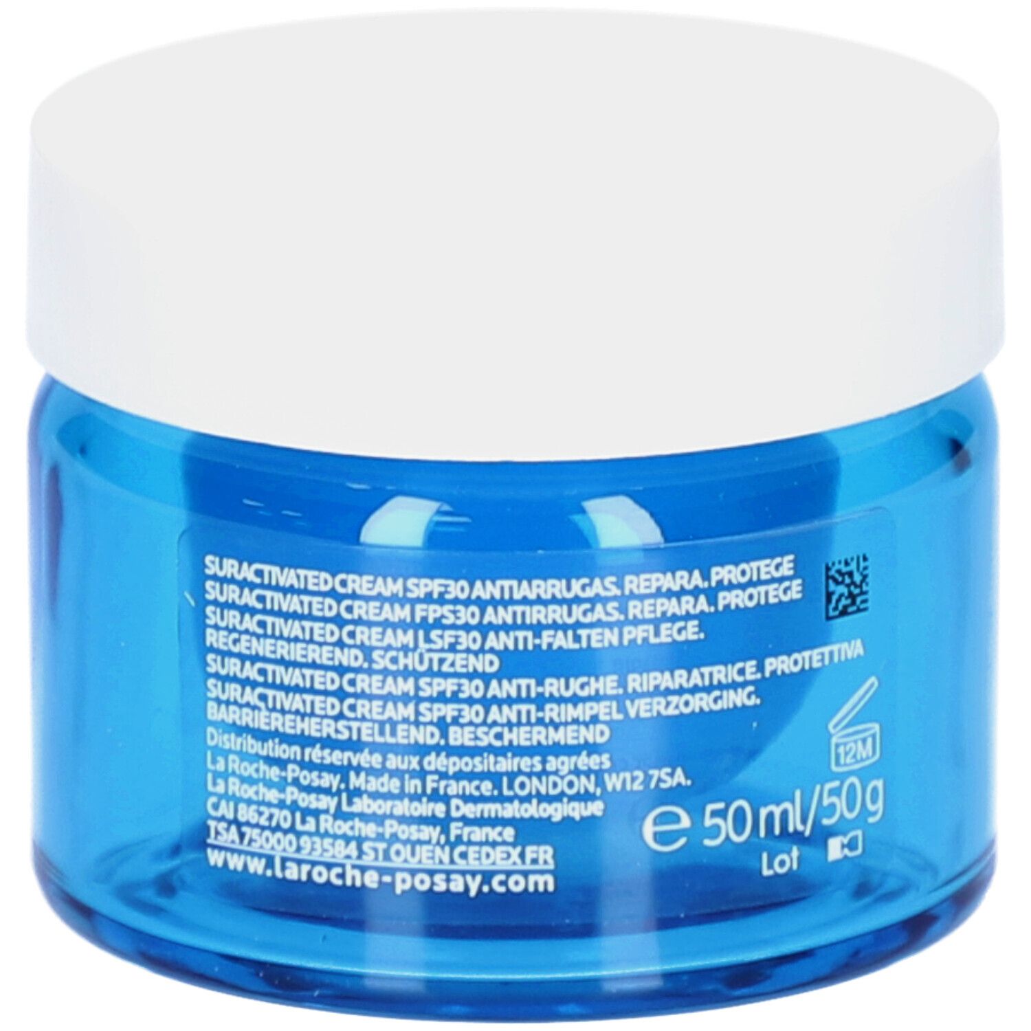 Pot de crème bleu avec couvercle blanc. Arrière avec texte.