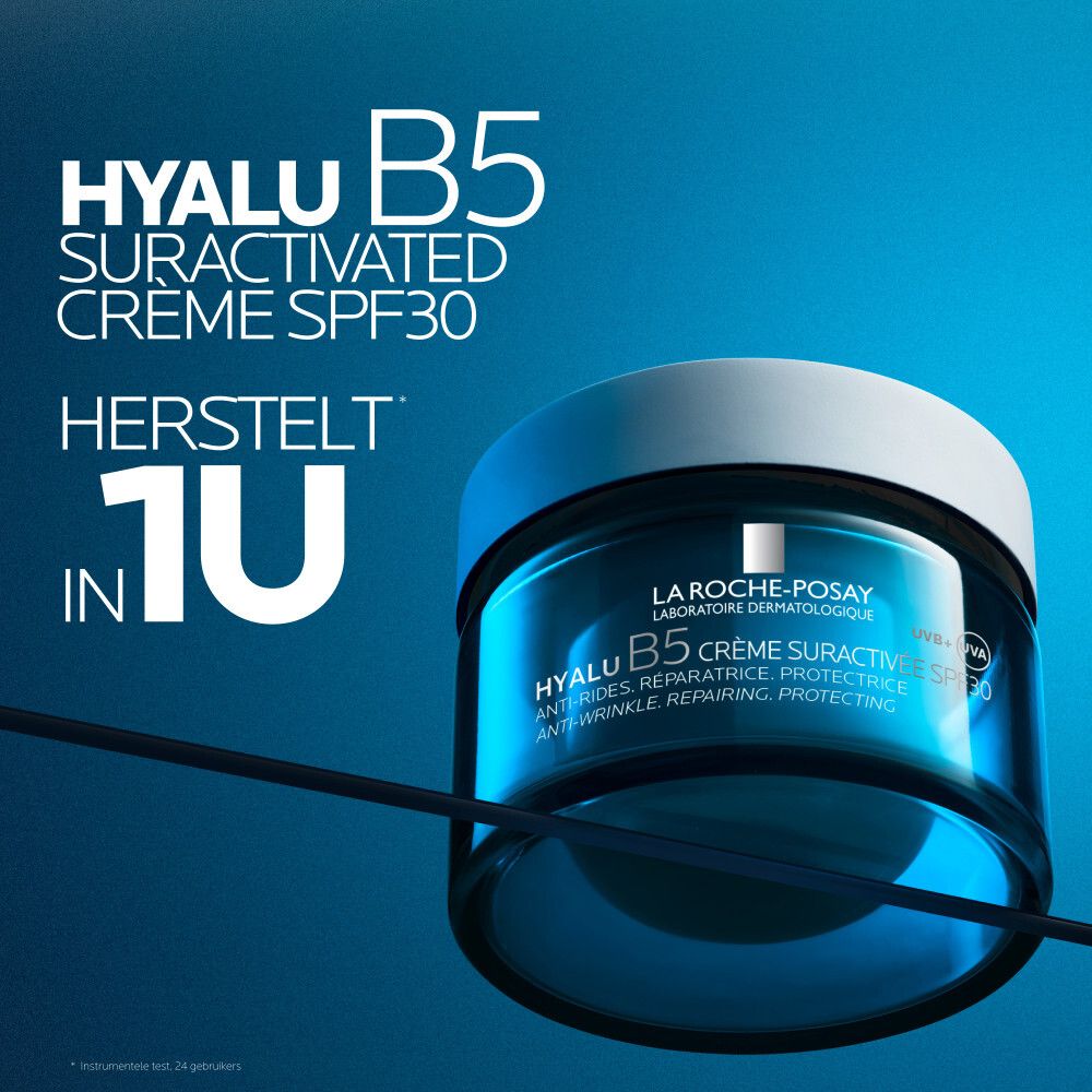 Blauwe pot met witte deksel. Tekst: Hyalu B5 Suractivée Crème SPF30. Herstelt in 1U.