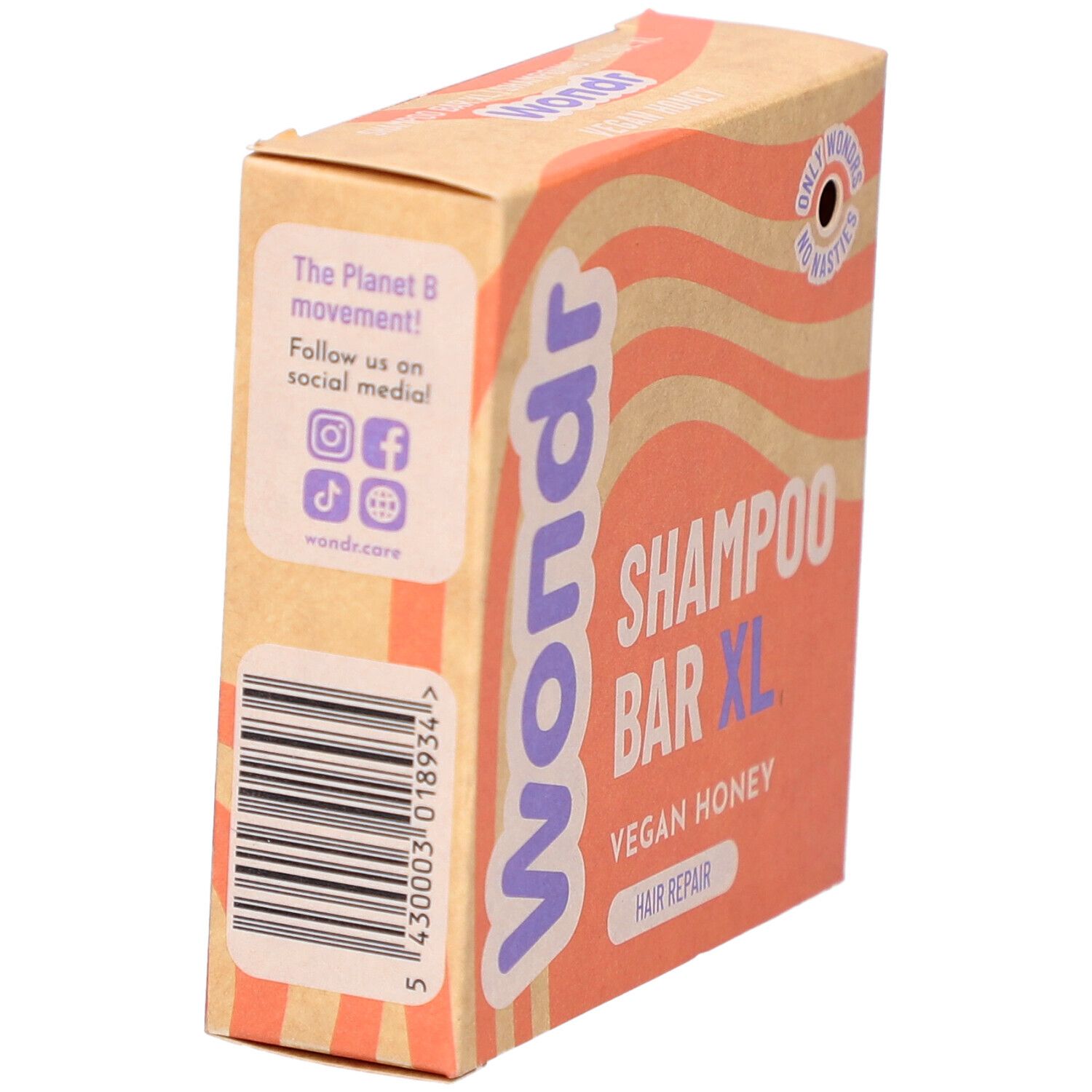 Kartonnen verpakking met Wondr, Shampoo Bar XL, Vegan Honey. Zijkant met barcode en social media iconen.