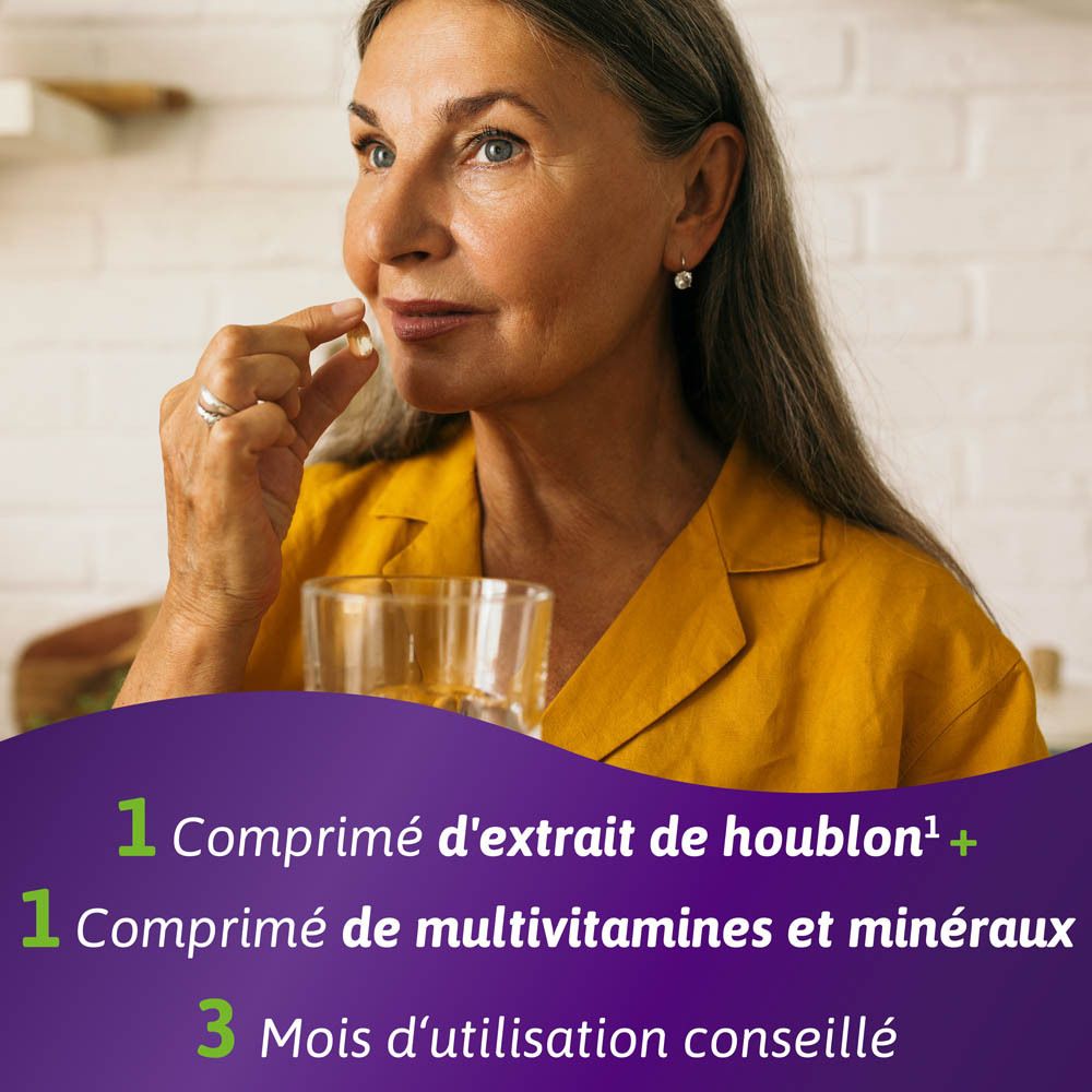 Femme prend un comprimé. Omnibionta menopause plus. 1 extrait de houblon, 1 multivitamines.