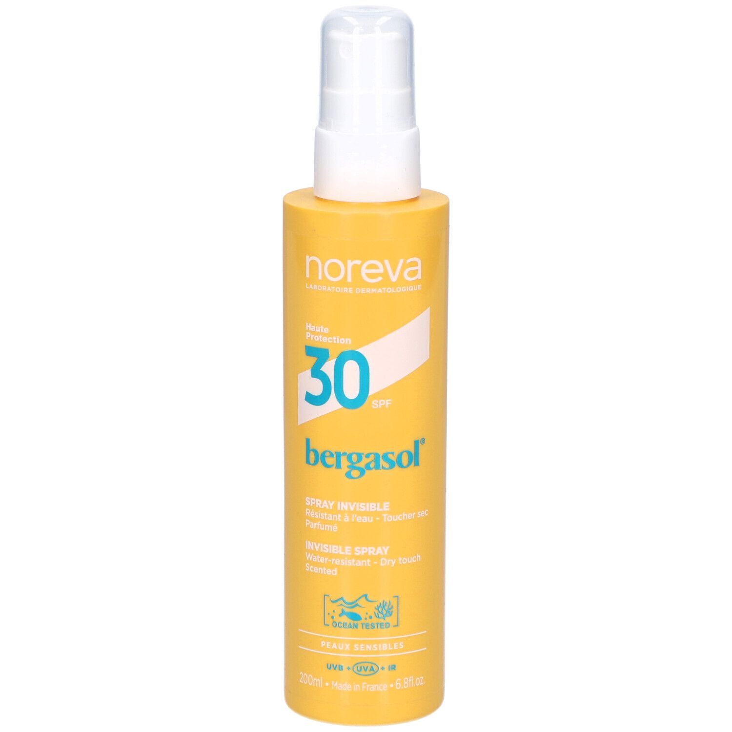Flacon spray jaune avec tête blanche. Inscription : Noreva, SPF 30, Bergasol, Invisible Spray. Avec certifications.