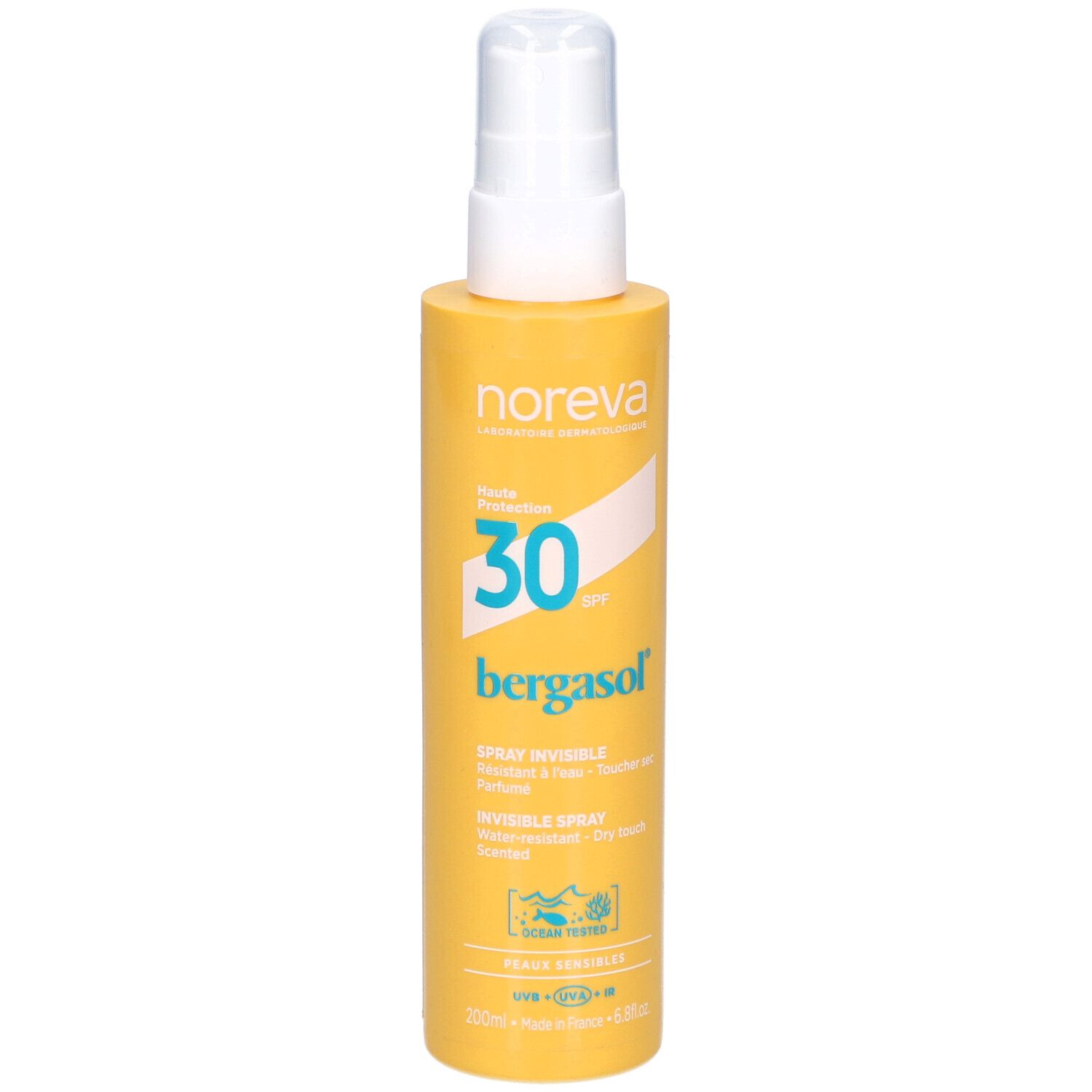 Flacon spray jaune avec tête blanche. Inscription : Noreva, SPF 30, Bergasol, Invisible Spray. Avec certifications.