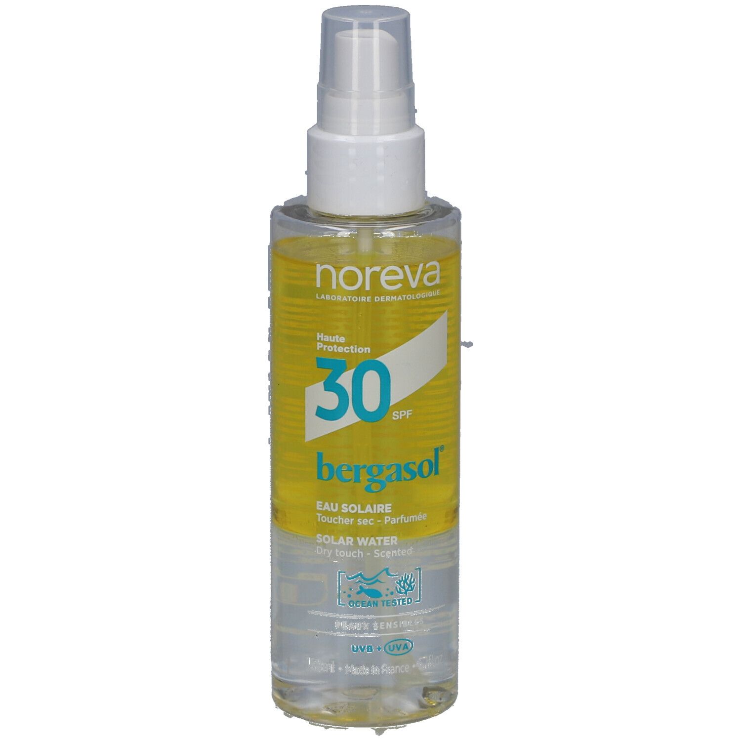 Spray solaire SPF30. Flacon transparent avec liquide jaune. Tête de pulvérisation blanche. Marque Noreva et nom du produit visibles.