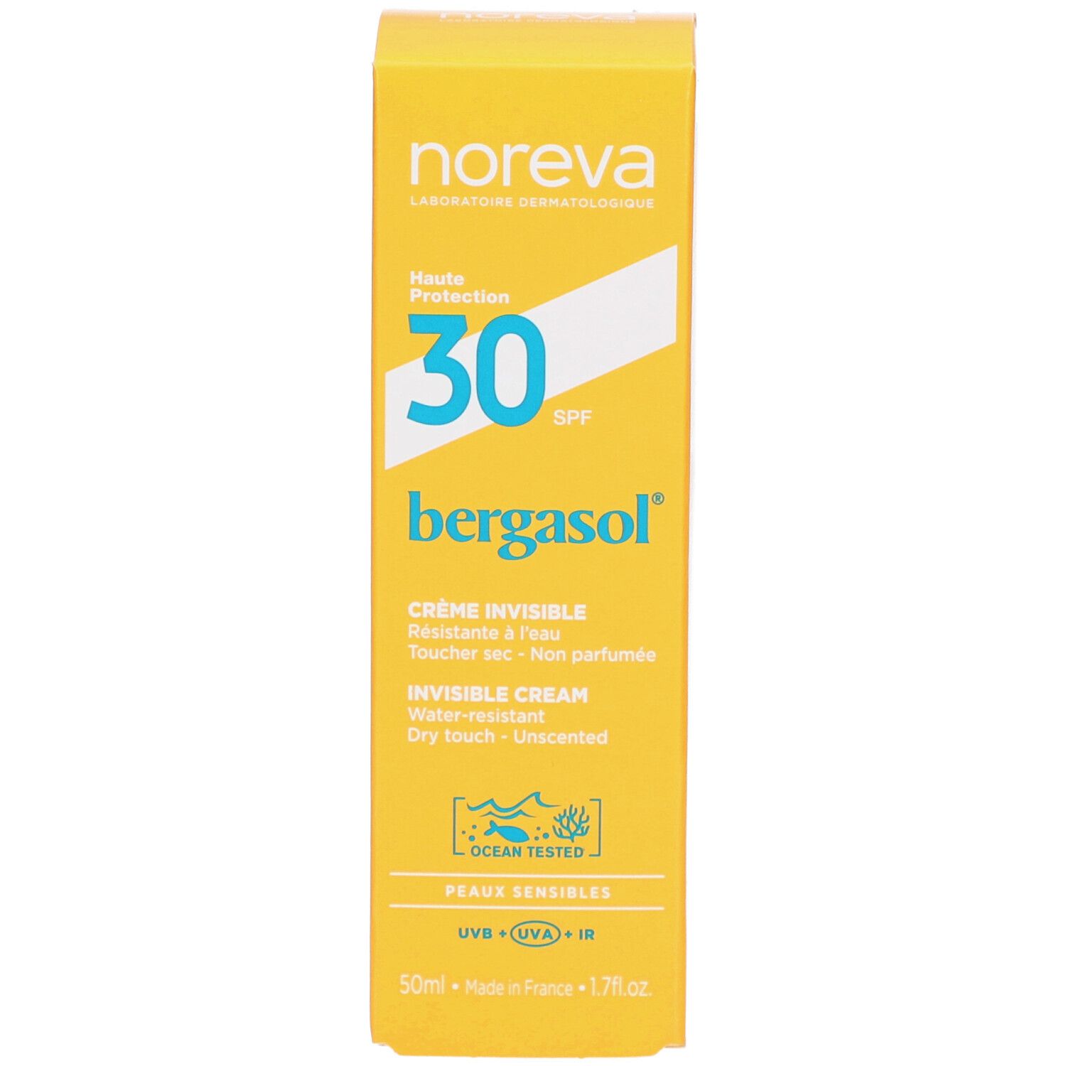 Boîte jaune de crème solaire. Inscriptions : Noreva, SPF 30, bergasol, Crème Invisible. Avec logo.