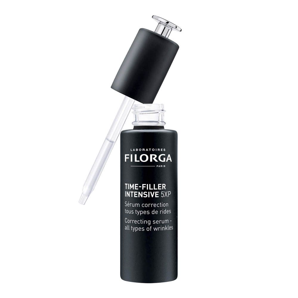 Flacon de sérum Filorga Time-Filler Intensive 5XP avec applicateur. Flacon noir, bouchon argenté.