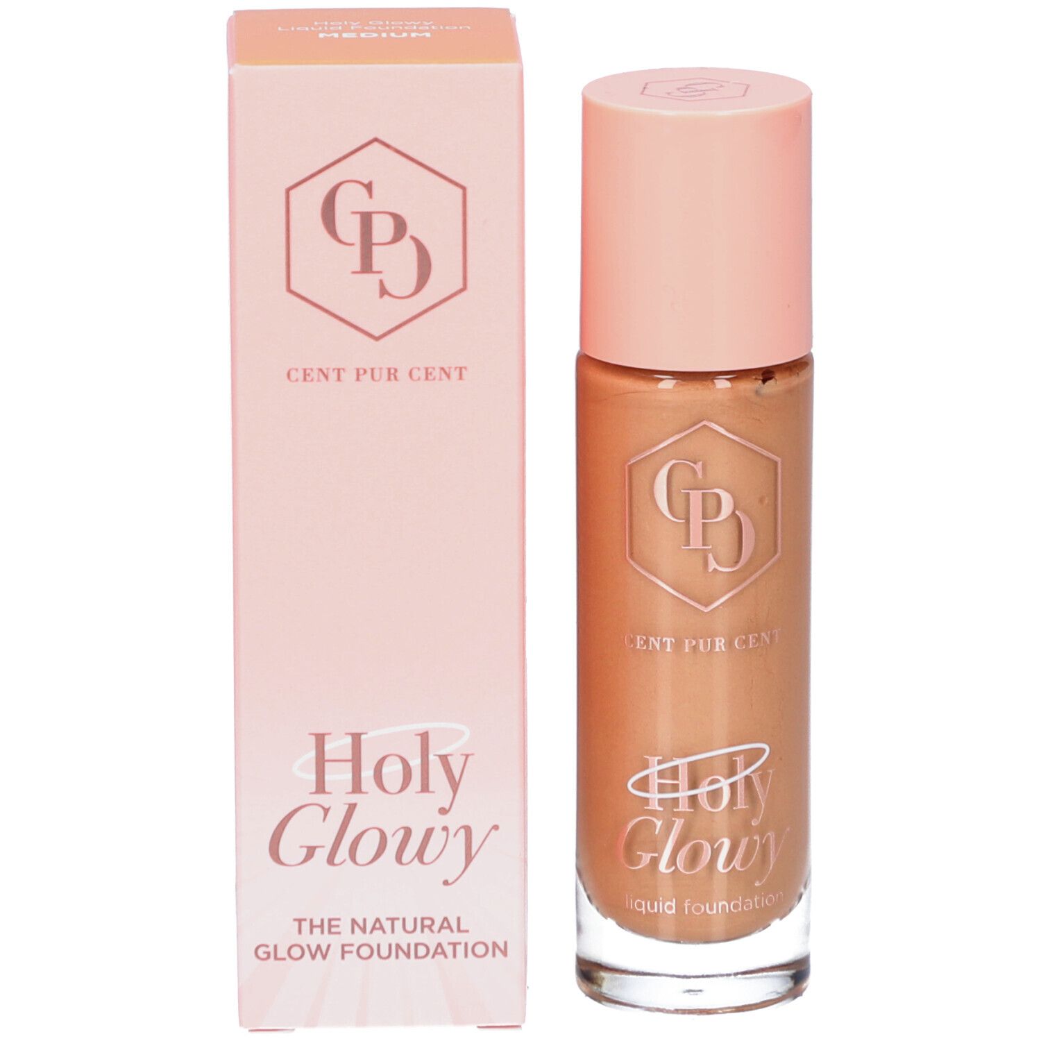 Foundation en verpakking. Opschrift: Holy Glowy, Cent Pur Cent, The Natural Glow Foundation.