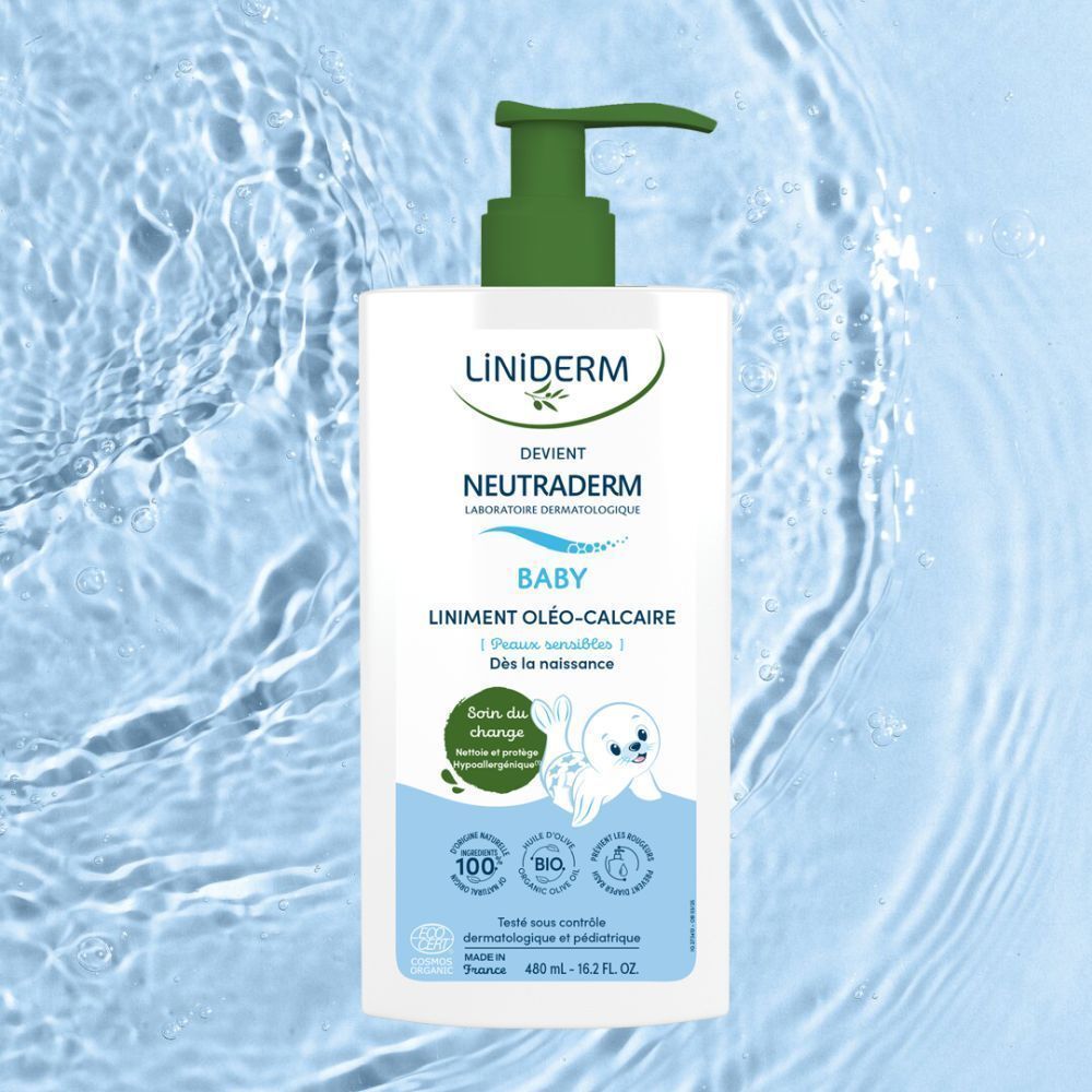 Witte fles met groene pomp. Opschrift: Liniderm, Neutraderm Baby, Liniment Oléo-Calcaire. Met bio-label en baby-illustratie.