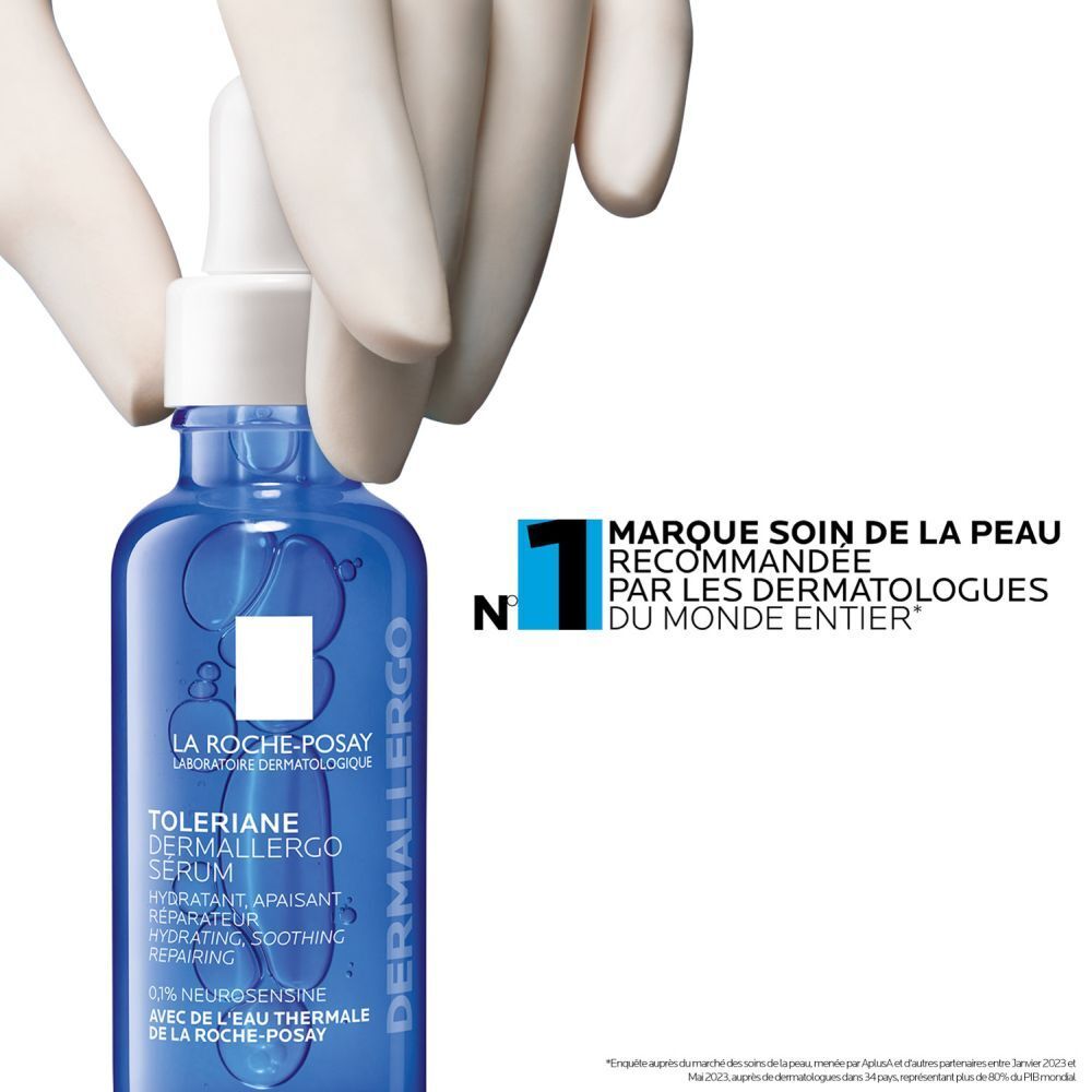 Flacon bleu avec sérum. Texte: N°1 marque soin de la peau recommandée par les dermatologues.