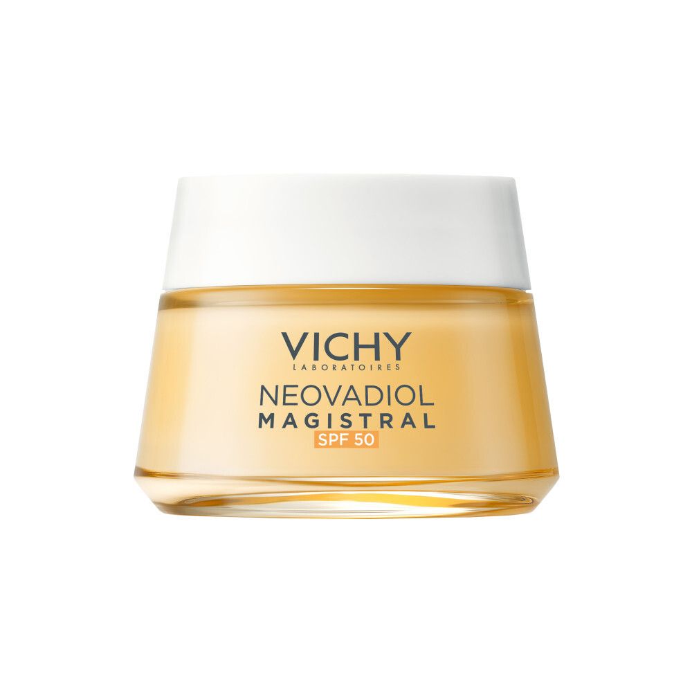 Crèmepot met witte deksel. Opschrift: Vichy, Neovadiol Magistral SPF 50. Geelachtige crème zichtbaar.