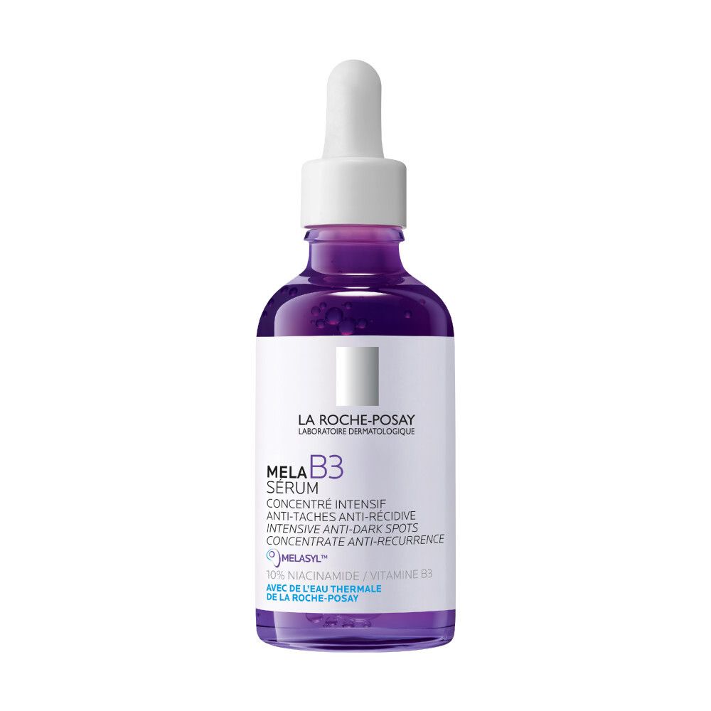 Paarse fles Mela B3 Serum. Met pipet. Tekst: Mela B3 Serum, anti-vlekken.