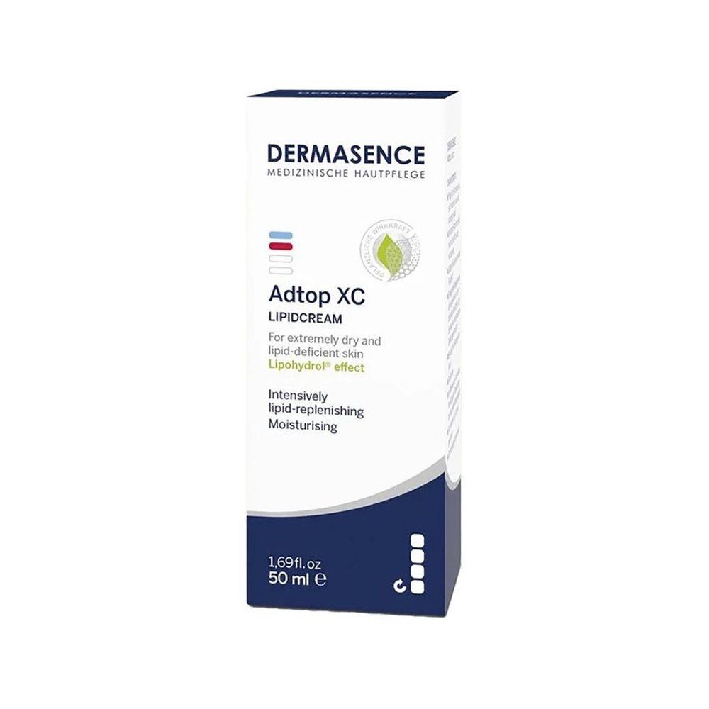 Witte doos met blauwe en groene tekst. Opschrift: Dermasence Adtop XC Lipidcream. 50 ml.