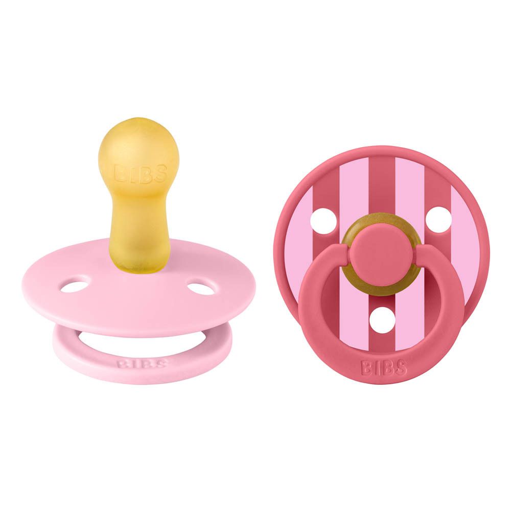 Twee roze fopspenen voor baby's. Ronde vorm, ring. BIBS-logo zichtbaar.
