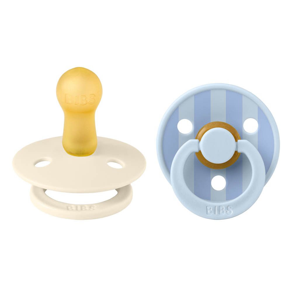 Deux sucettes. Une sucette crème et une bleue. Marque BIBS, +6 mois.