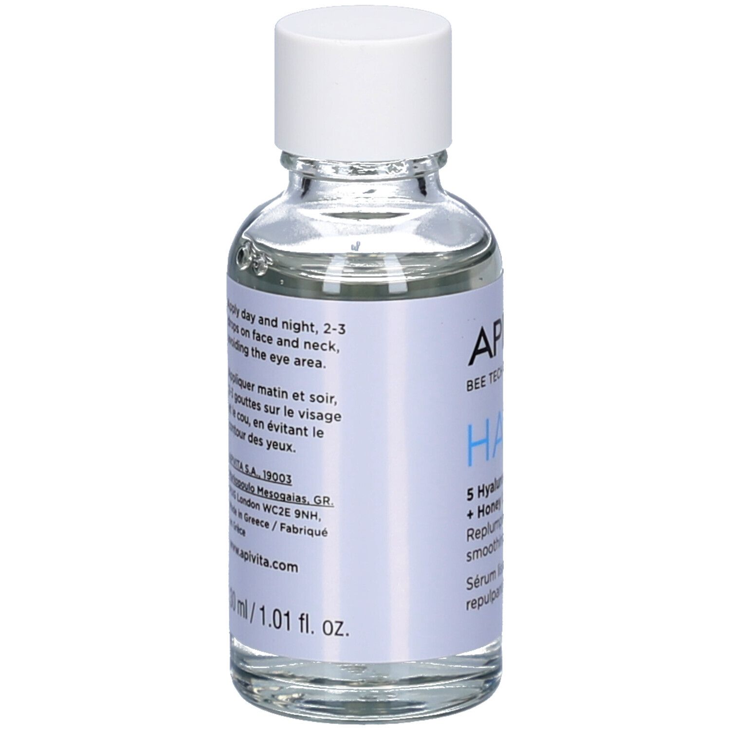Dos du flacon en verre. Contient des informations sur l'utilisation, l'adresse du fabricant et le volume. Apivita HA5 Honey Repair Sérum.