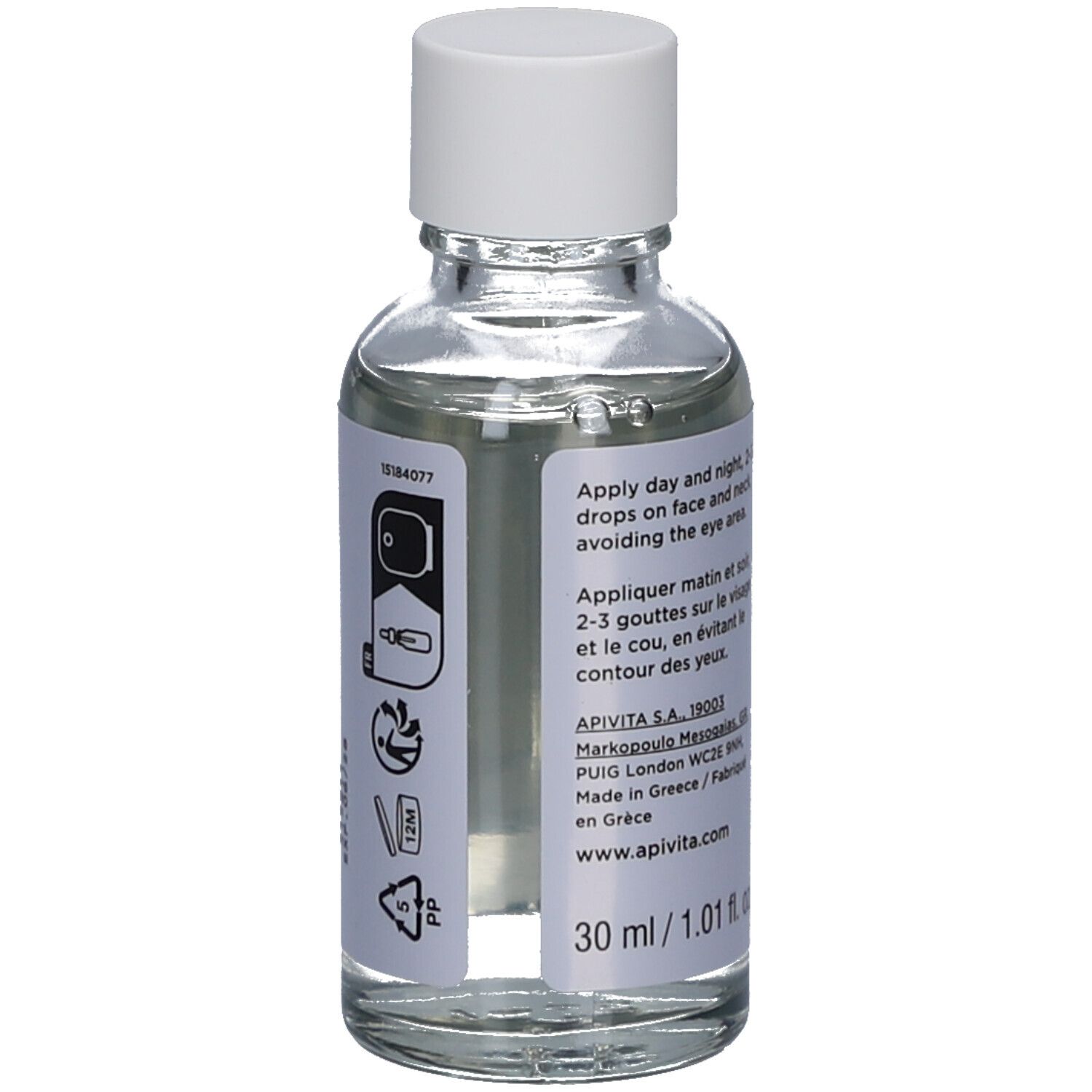 Dos du flacon en verre. Contient des informations sur l'utilisation, l'adresse du fabricant et le volume. Apivita HA5 Honey Repair Sérum.