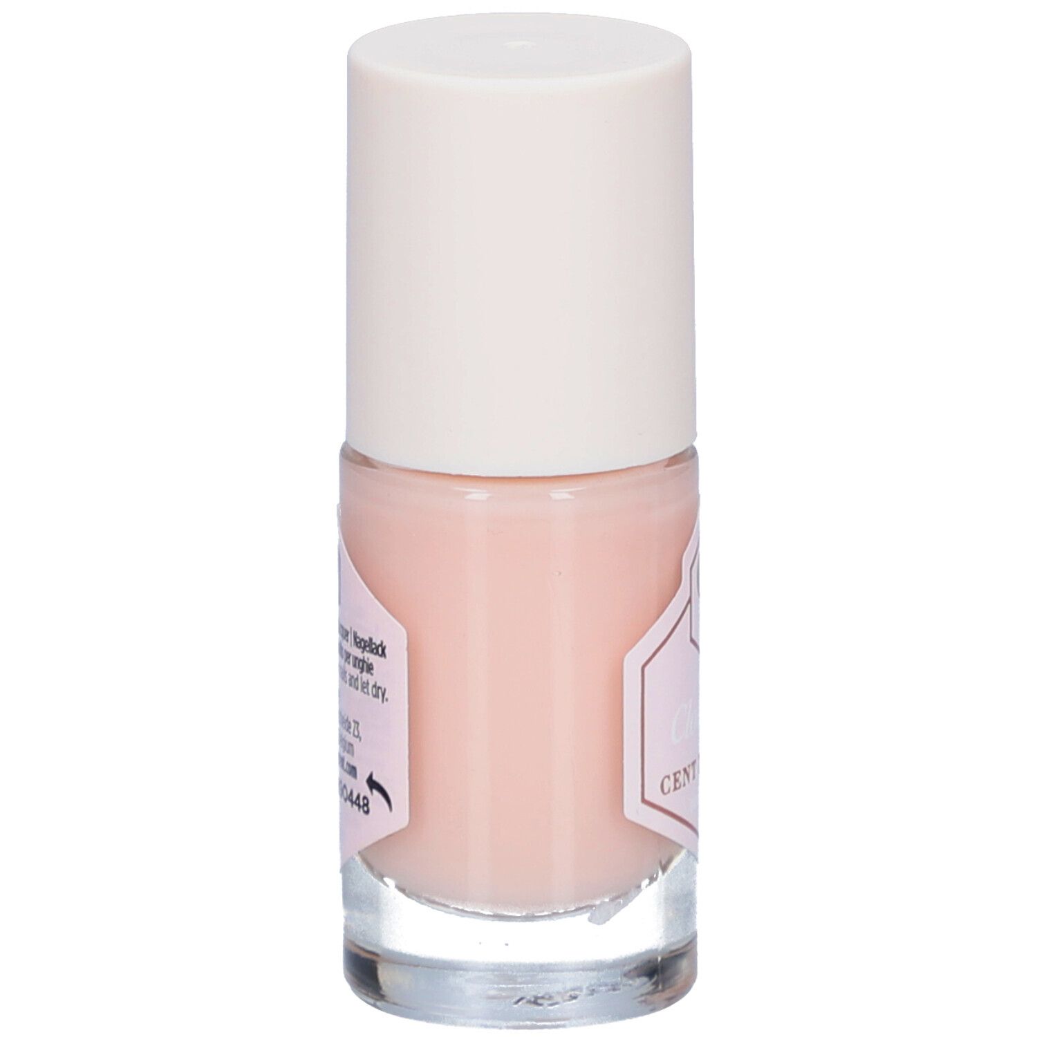 Achterkant nagellakflesje. Roze inhoud, witte dop. Etiket met tekst, waaronder "Cloud nine".