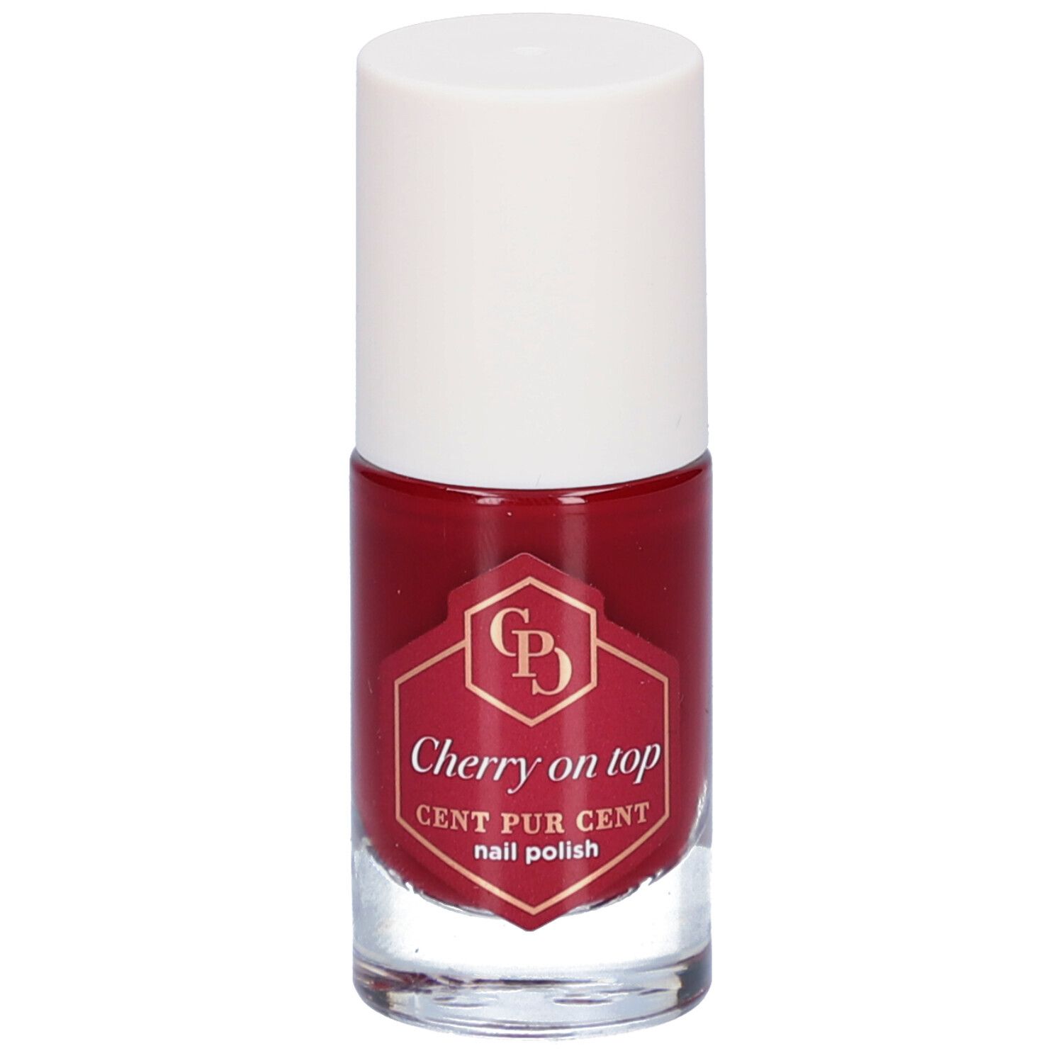 Flacon de vernis à ongles rouge avec bouchon blanc. L'étiquette indique "Cherry on top" et "CENT PUR CENT nail polish".