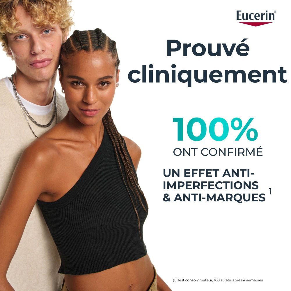 Tube blanc Eucerin DERMOPURE CLINICAL Crème Corps Correctrice. Inscription et logo bleus.