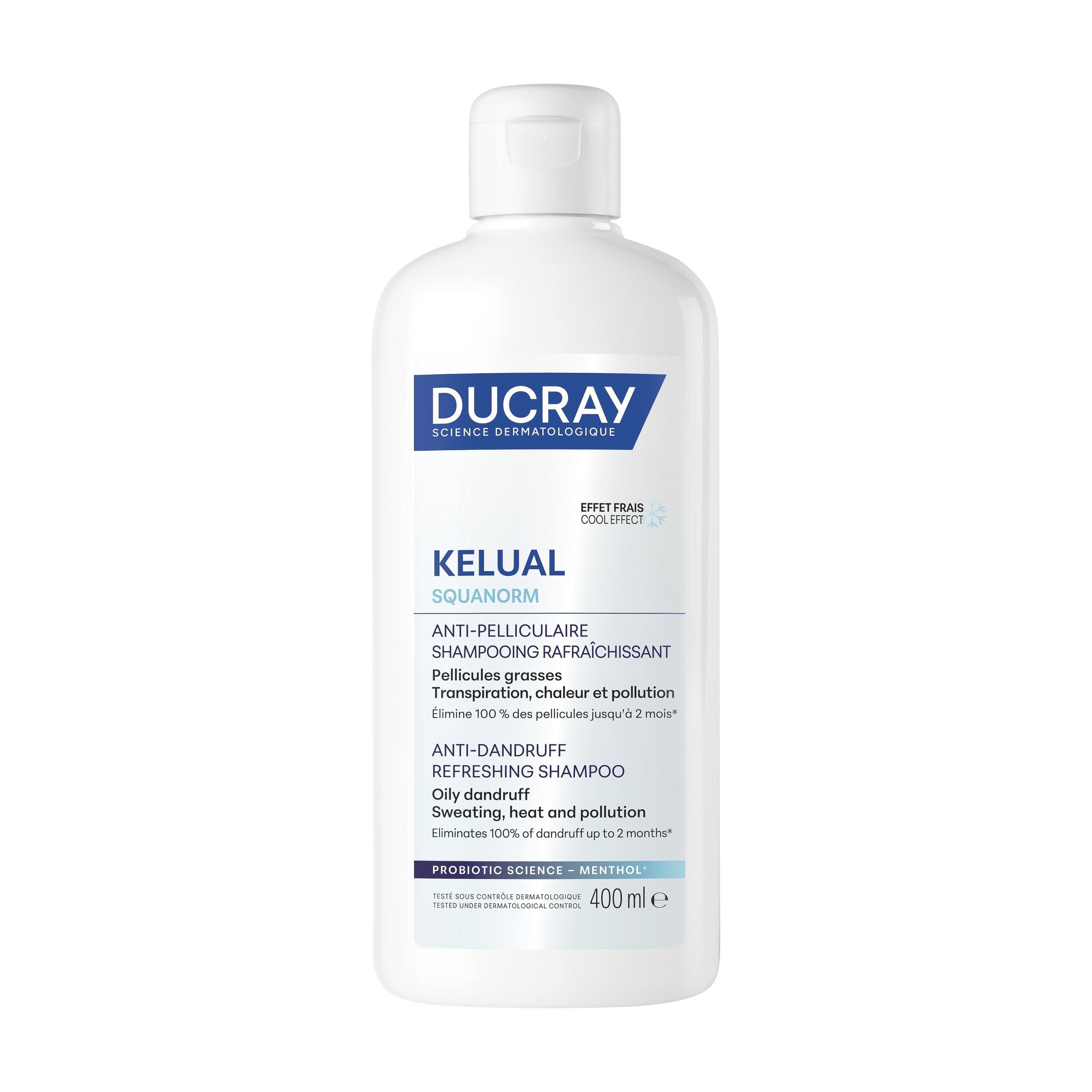 Witte shampoo fles. Opschrift: DUCRAY, KELUAL SQUANORM, Anti-roos shampoo. 400 ml.