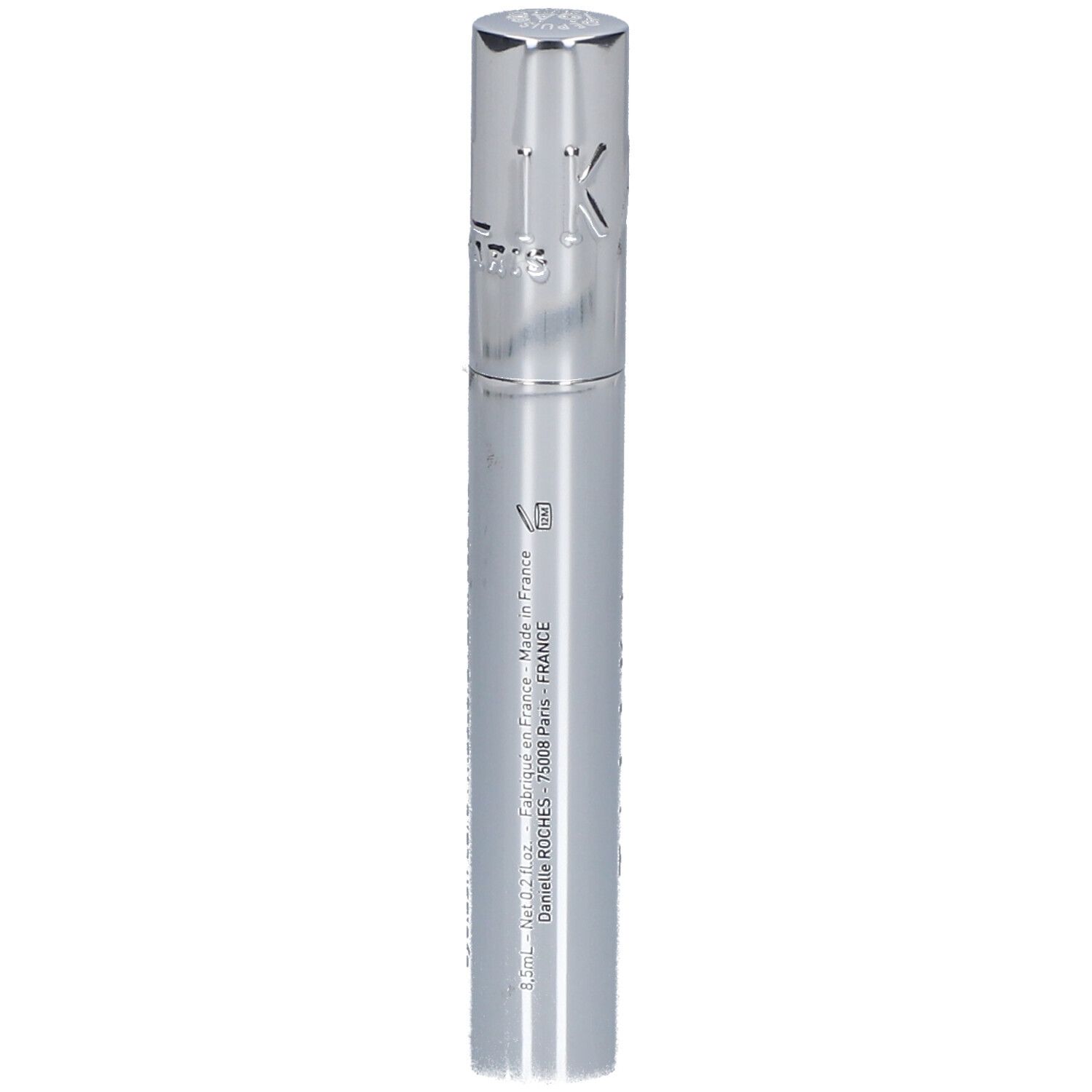 Tube de mascara argenté avec texte noir. Bouchon avec gravure : KA.