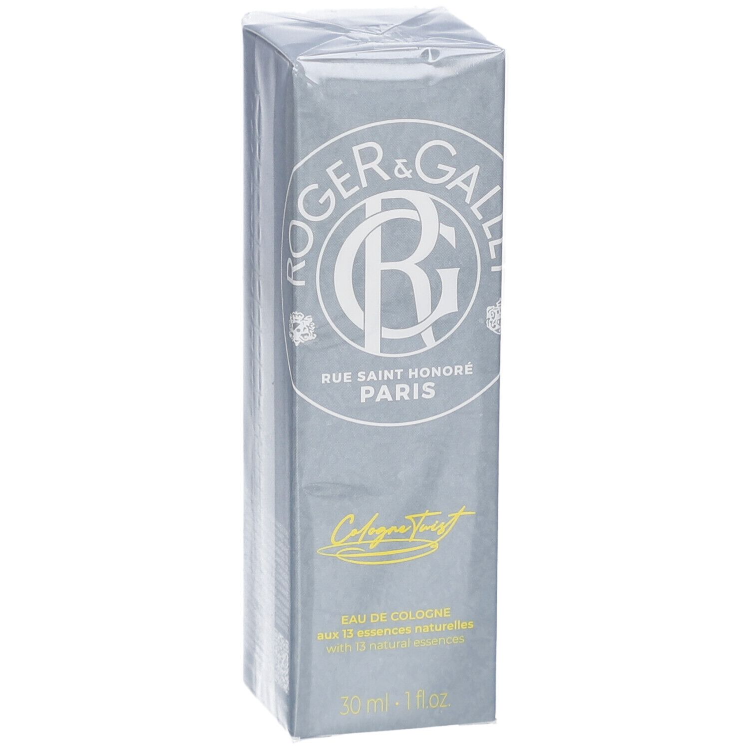 Grijze rechthoekige doos met logo en tekst. Opschrift: Eau de Cologne, 30 ml - 1 fl oz. Verpakt in folie.